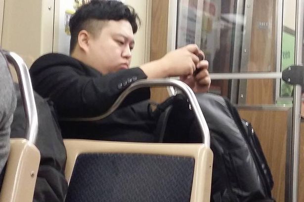 Kim-Jong-Un-look-a-like-spotted-on-train-carriage